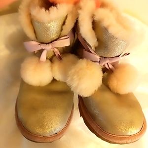 UGG Gita metallic silver pom pom boots size 5 S/N 1019701K